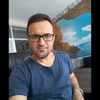 İzzet Güllü Kimdir?
