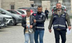 Tartıştığı kişinin aracına tüfekle ateş açtı