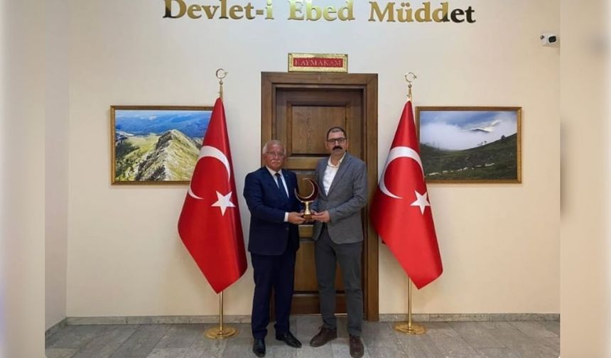 Taşköprü’ye ödülle döndü, Kaymakam Demirdağ makamında ağırladı